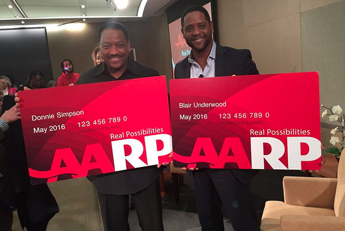 National AARP Spokespersons Donnie Simpson and Blair Underwood showing off their AARP membership cards.